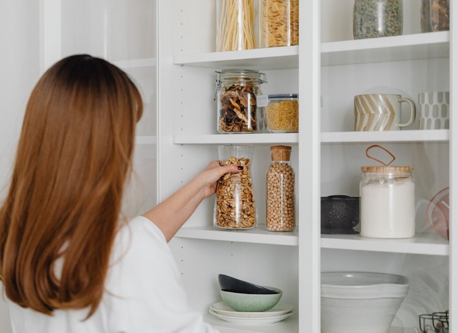 Use Clear Containers and Stackable Bins in the Pantry